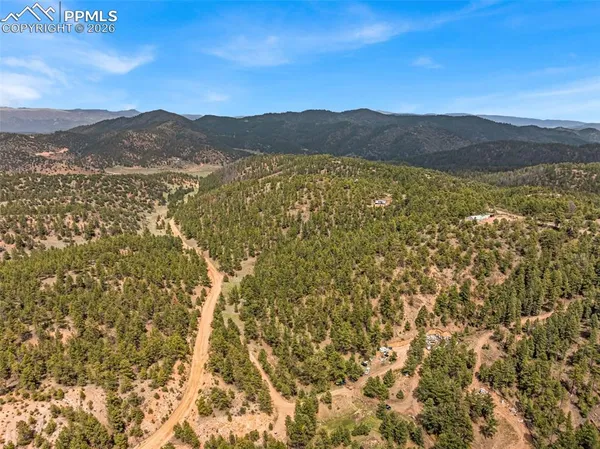 a view of mountain with lake view