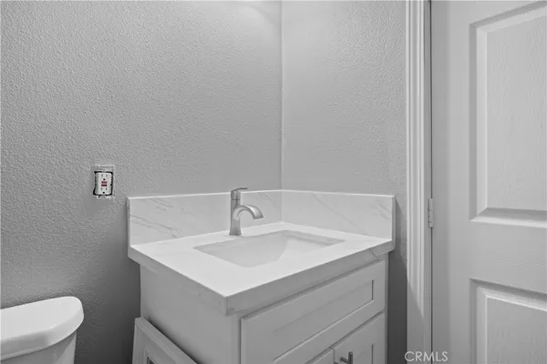 a bathroom with a sink and a toilet