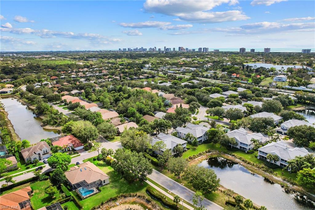 7132 Timberland Circle, Unit 201 Naples, FL 34109 - Photo 33 of 46 an aerial view of a city