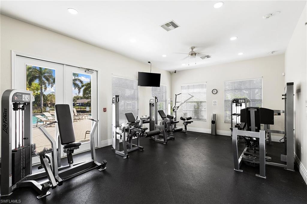 7132 Timberland Circle, Unit 201 Naples, FL 34109 - Photo 39 of 46 a view of a room with gym equipment