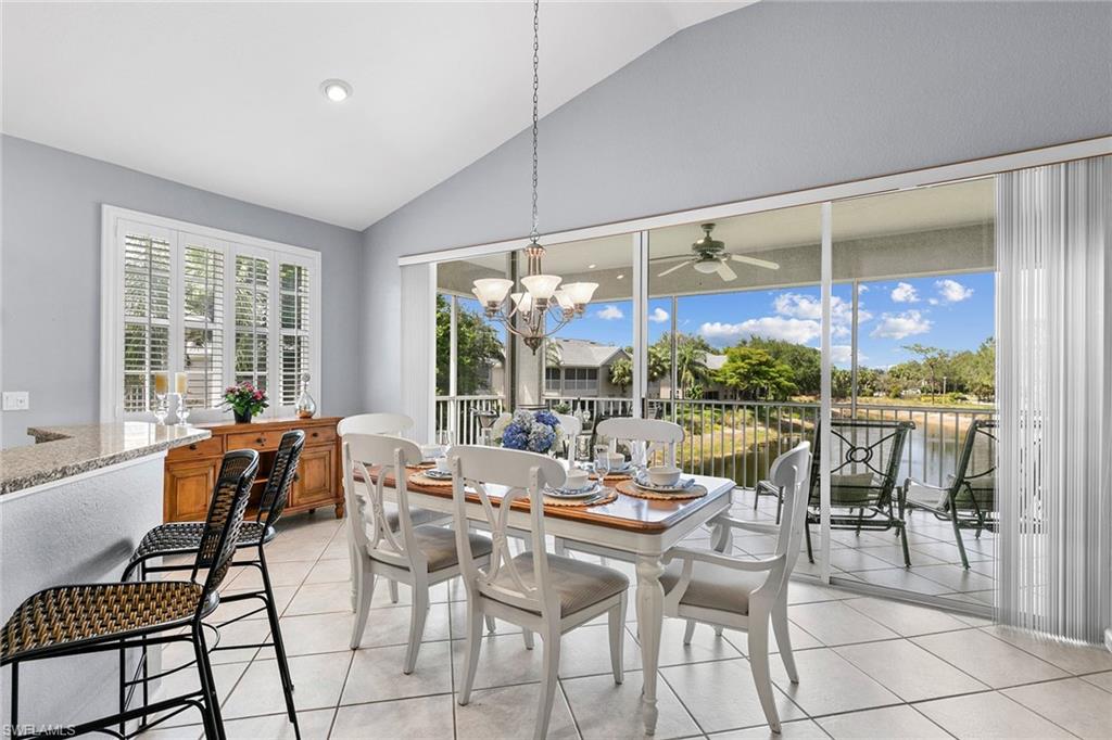 7132 Timberland Circle, Unit 201 Naples, FL 34109 - Photo 9 of 46 a view of a dining room with furniture window and outside view