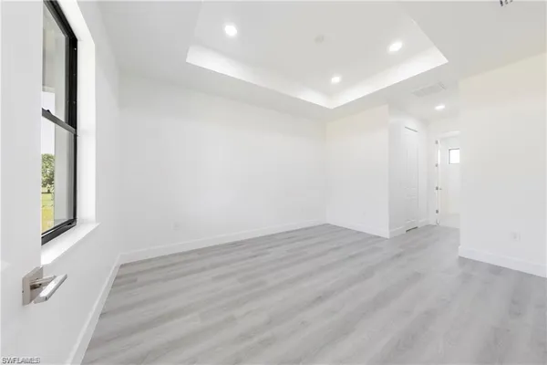 a bathroom with a double vanity sink toilet mirror and shower