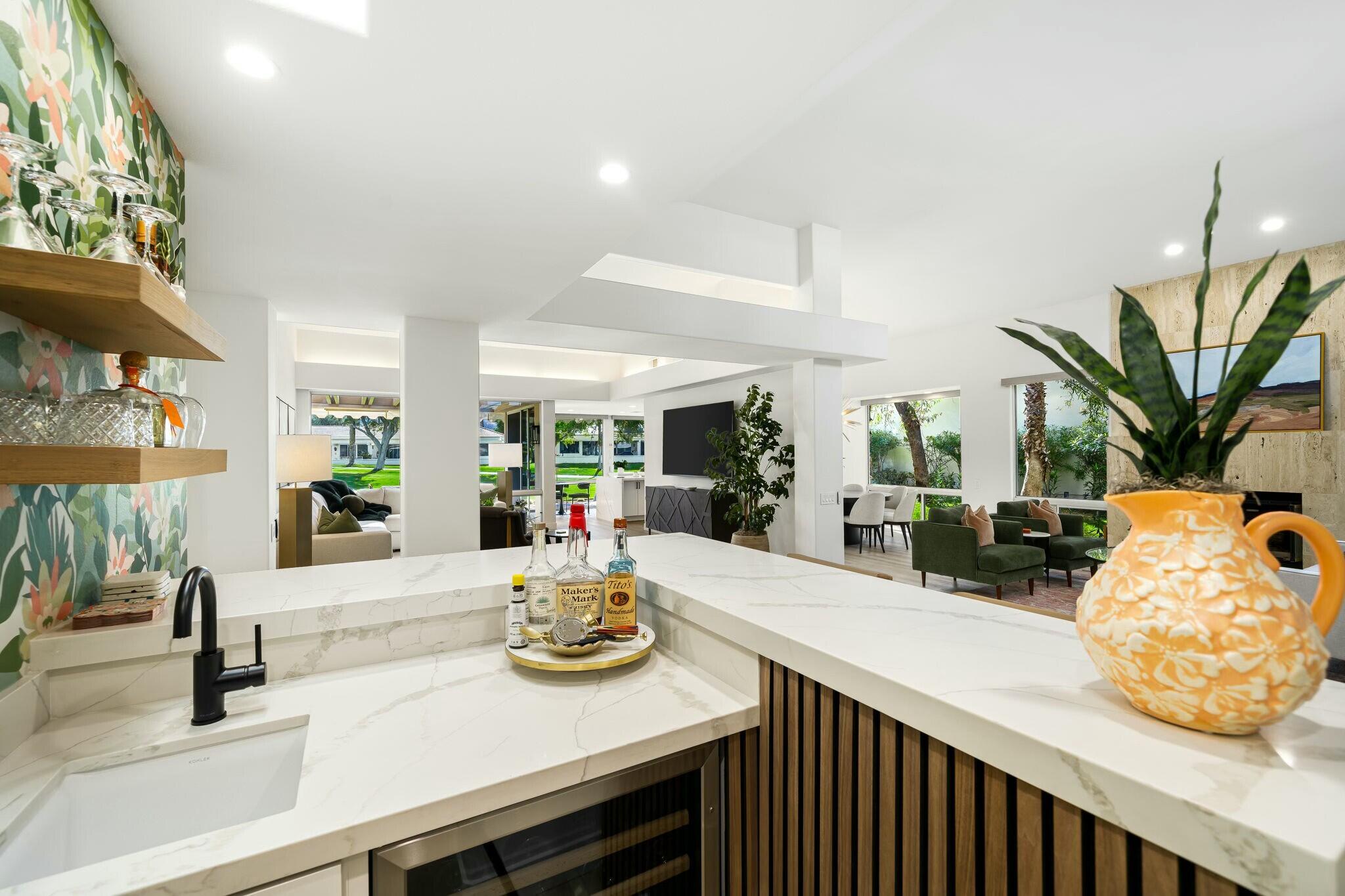 75405 Riviera Drive Indian Wells, CA 92210 - Photo 19 of 43 a view of kitchen with sink and living room