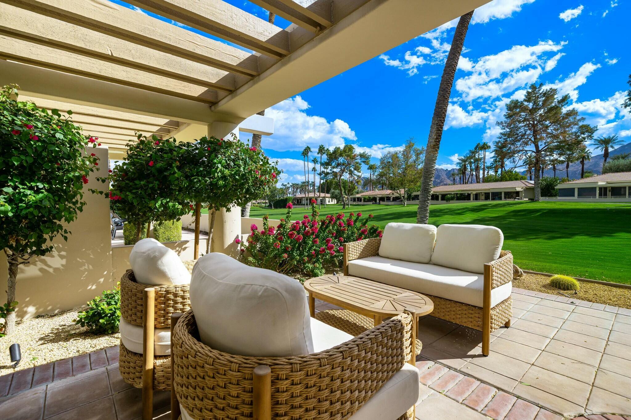 75405 Riviera Drive Indian Wells, CA 92210 - Photo 36 of 43 a outdoor living space with furniture and a garden