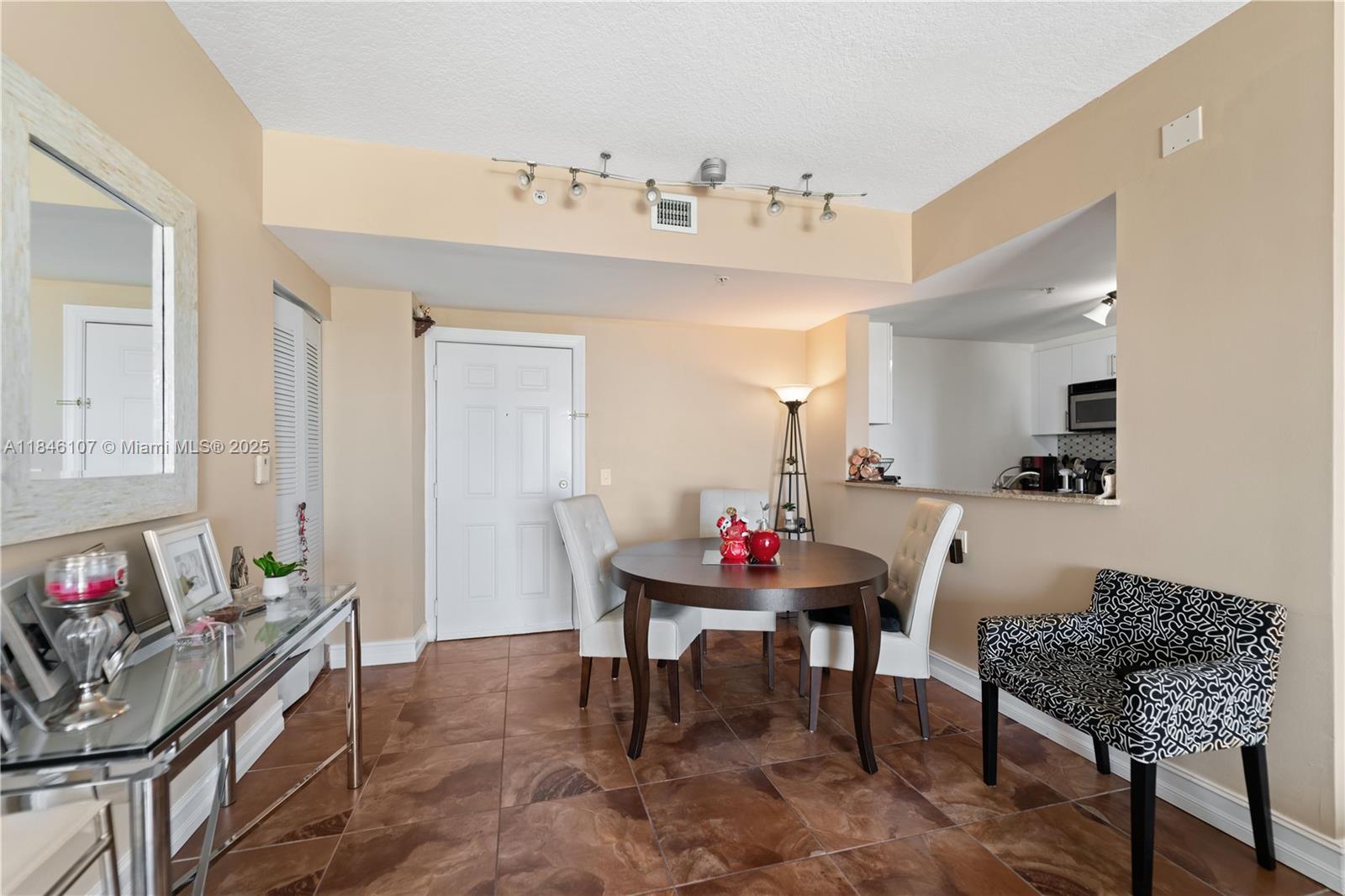 117 Northwest 42nd Avenue, Unit 1611 Miami, FL 33126 - Photo 10 of 20 a living room with furniture and wooden floor