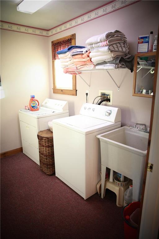 103 Dickerson Run Road Vanderbilt, PA 15486 - Photo 14 of 25 a utility room with dryer and washer