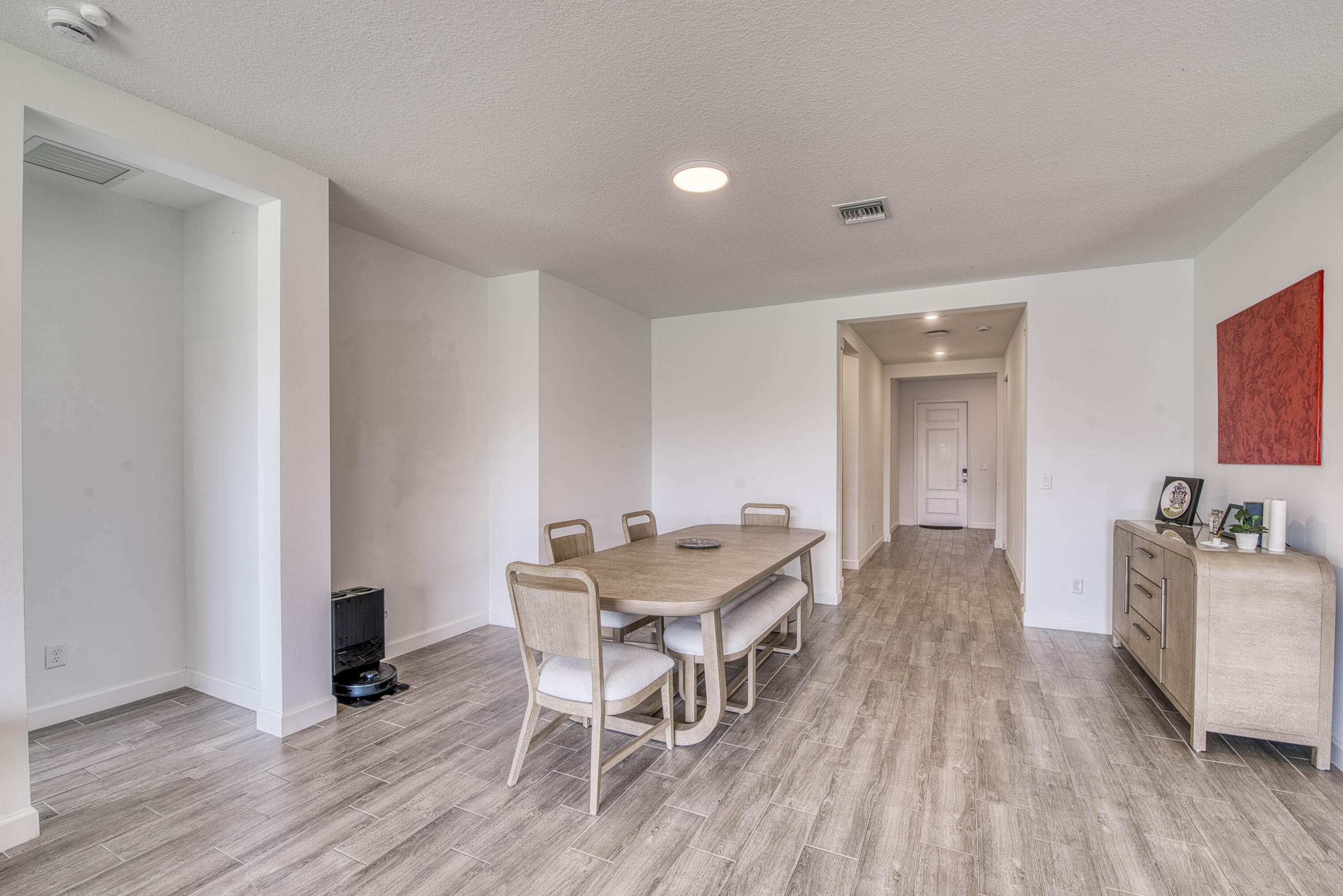 1463 Heron Nook Road Loxahatchee, FL 33470 - Photo 2 of 87 a living room with furniture and wooden floor