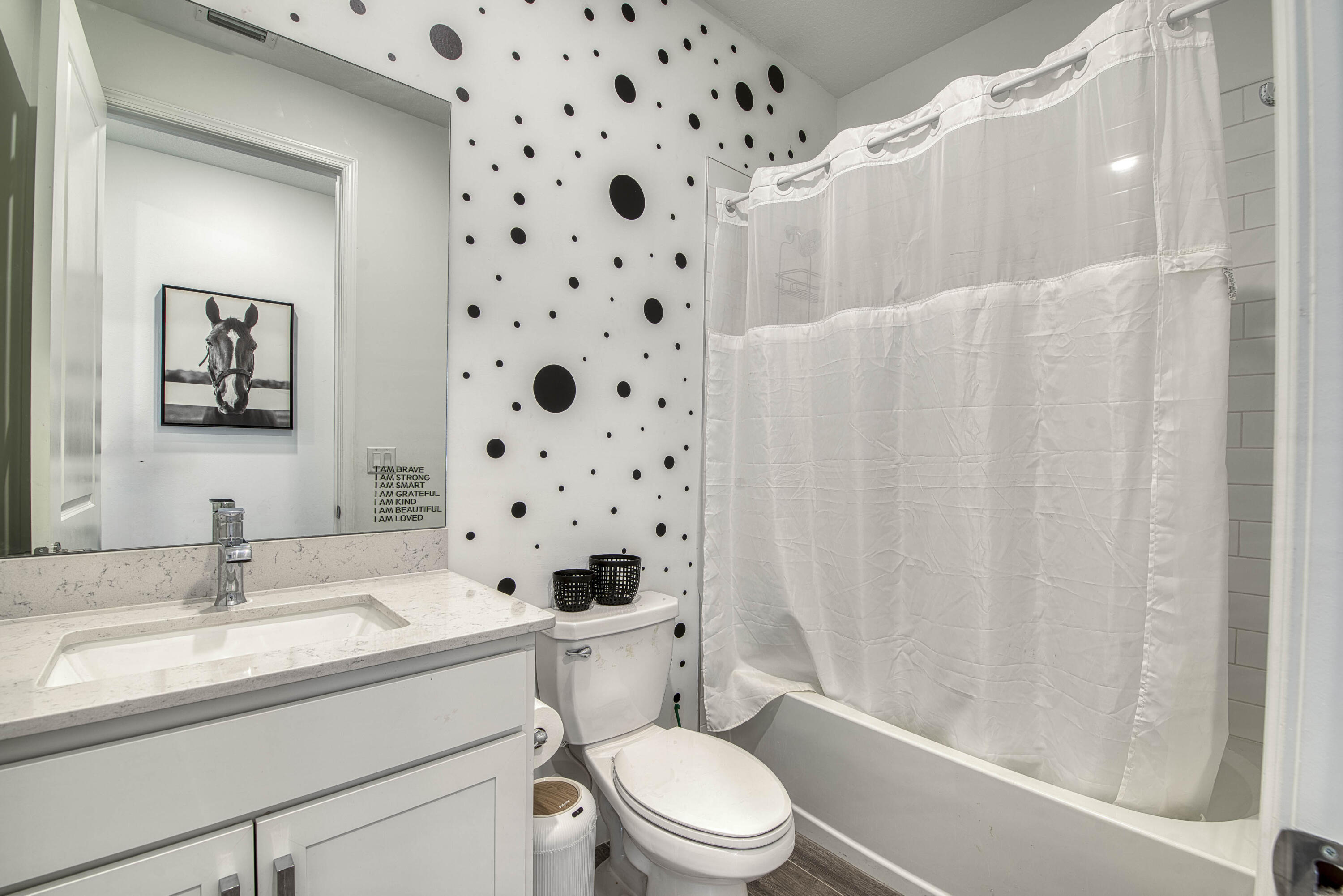 1463 Heron Nook Road Loxahatchee, FL 33470 - Photo 24 of 87 a bathroom with a sink toilet and shower