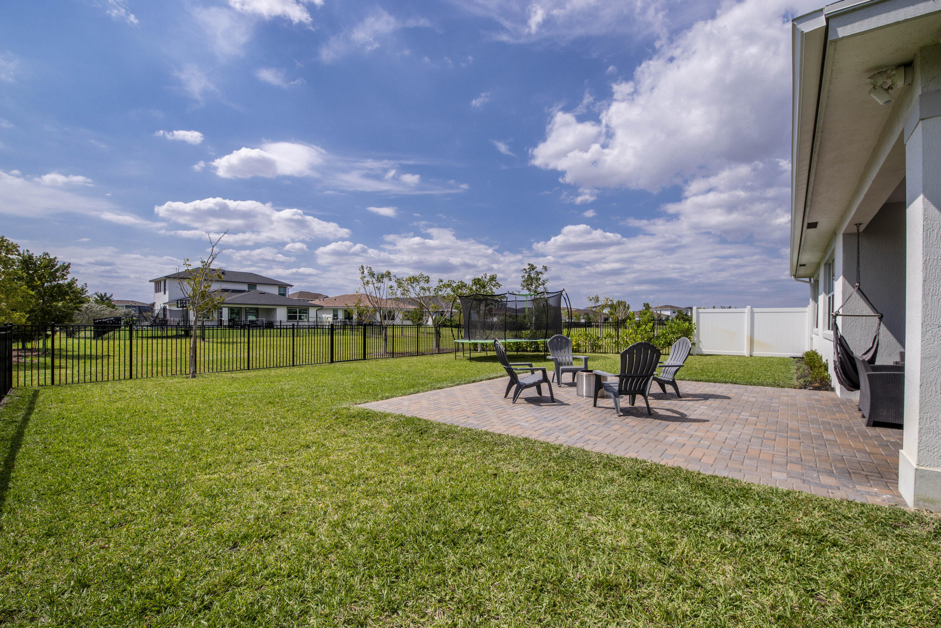 1463 Heron Nook Road Loxahatchee, FL 33470 - Photo 30 of 87 a view of a park with slide and a lake view