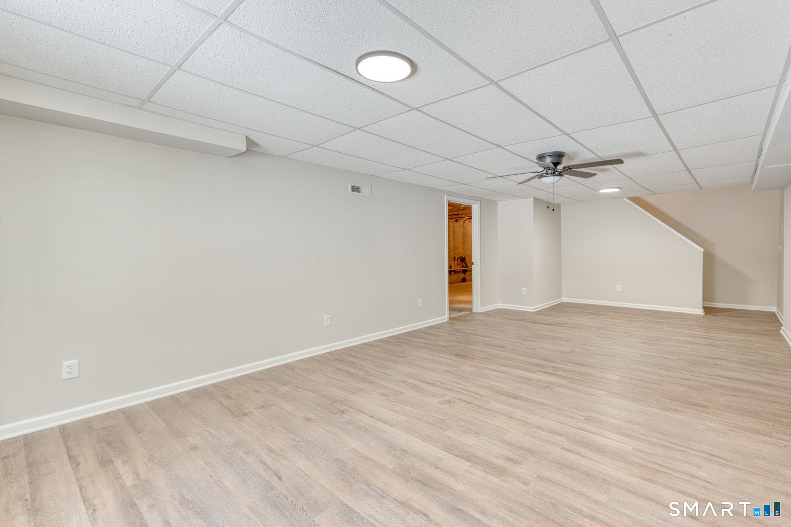 159 Jennifer Lane, Unit 159 Newtown, CT 06482 - Photo 24 of 28 wooden floor in an empty room