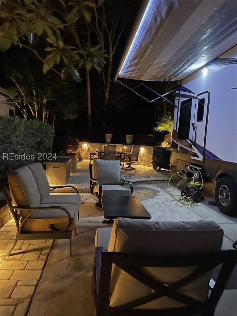 43B Jenkins Island Road Hilton Head Island, SC 29926 - Photo 13 of 19 View of patio / terrace with a storage shed