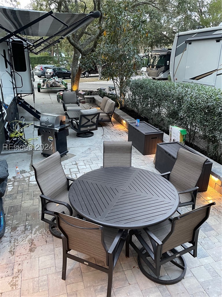 43B Jenkins Island Road Hilton Head Island, SC 29926 - Photo 7 of 19 View of patio / terrace with area for grilling and outdoor lounge area
