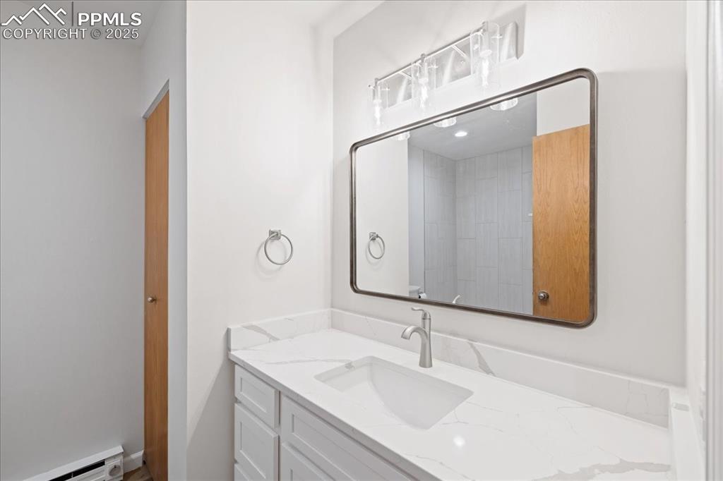 99 Granite Street, Unit 218 Frisco, CO 80443 - Photo 15 of 38 a bathroom with a sink and a mirror