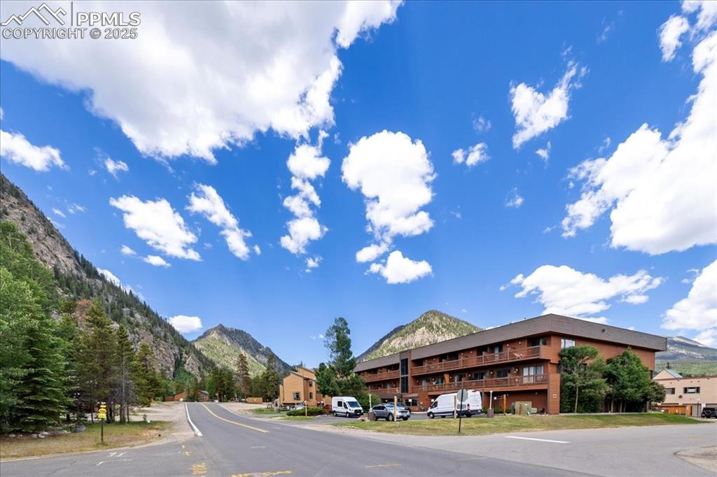 99 Granite Street, Unit 218 Frisco, CO 80443 - Photo 25 of 38 a view of a building with a street