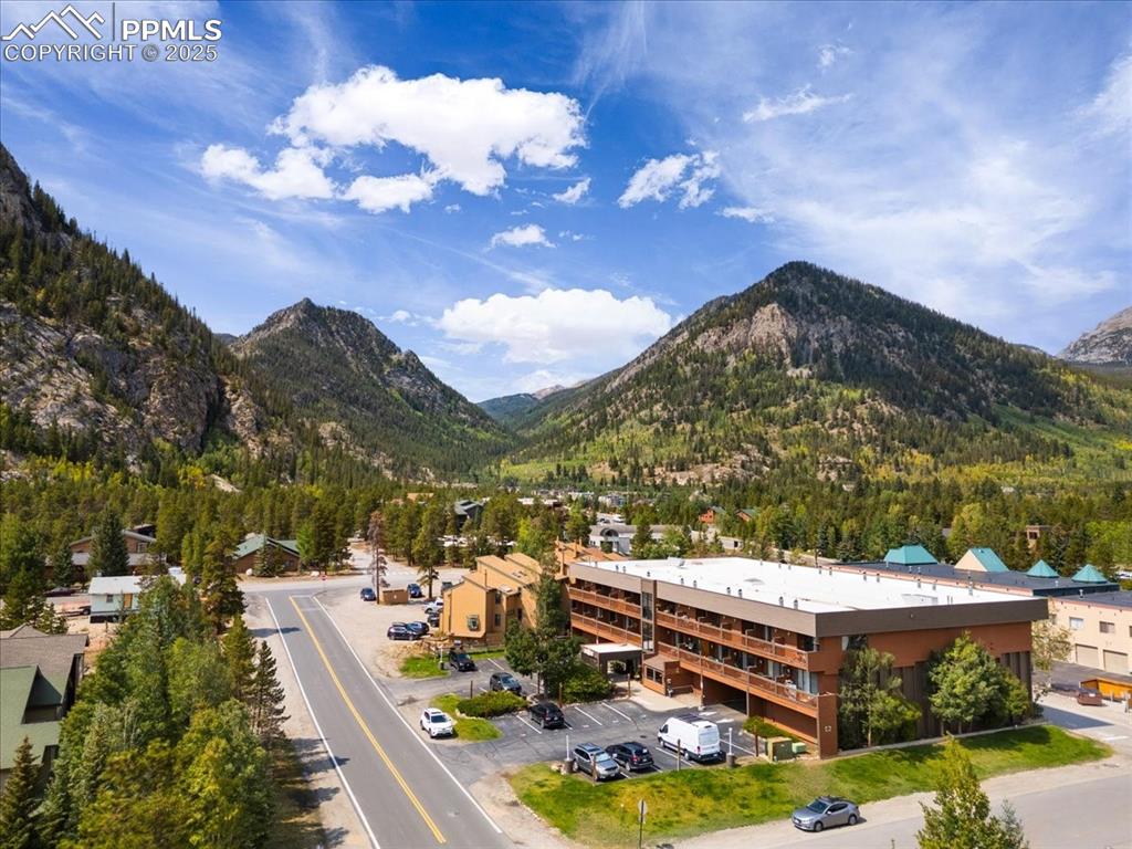 99 Granite Street, Unit 218 Frisco, CO 80443 - Photo 26 of 38 a view of a city with tall buildings