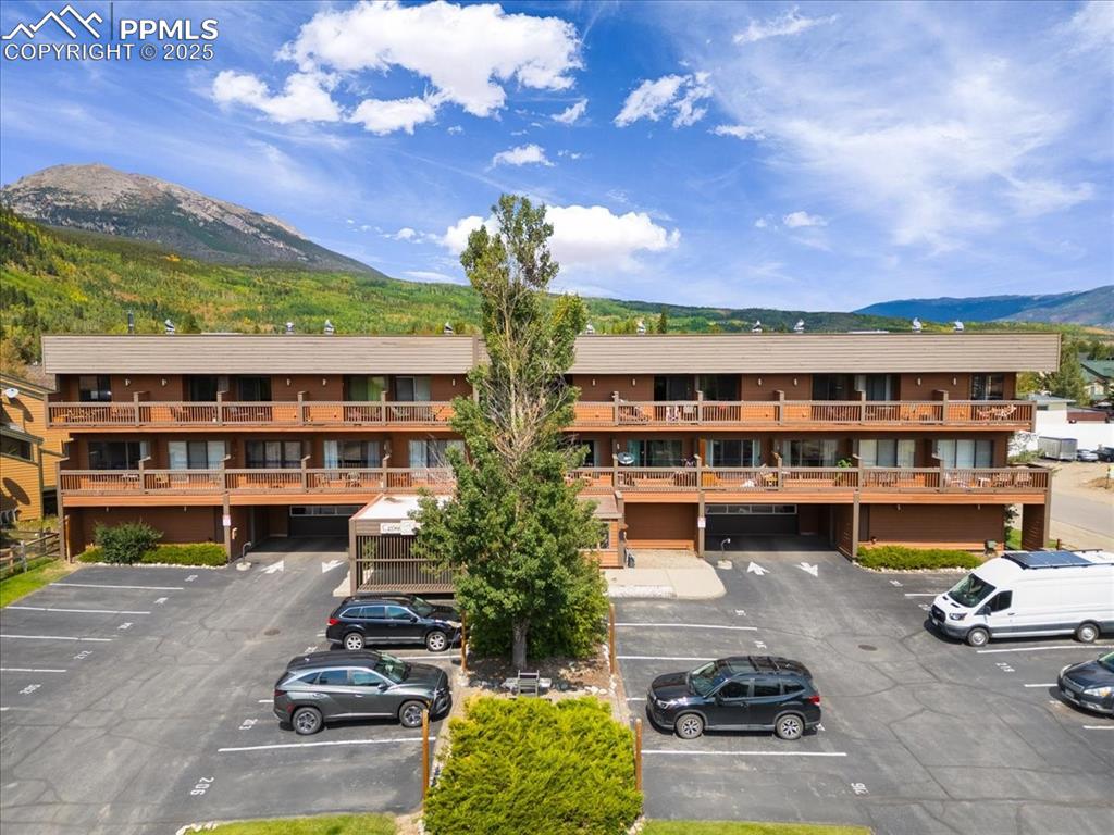 99 Granite Street, Unit 218 Frisco, CO 80443 - Photo 32 of 38 a front view of a building with garden