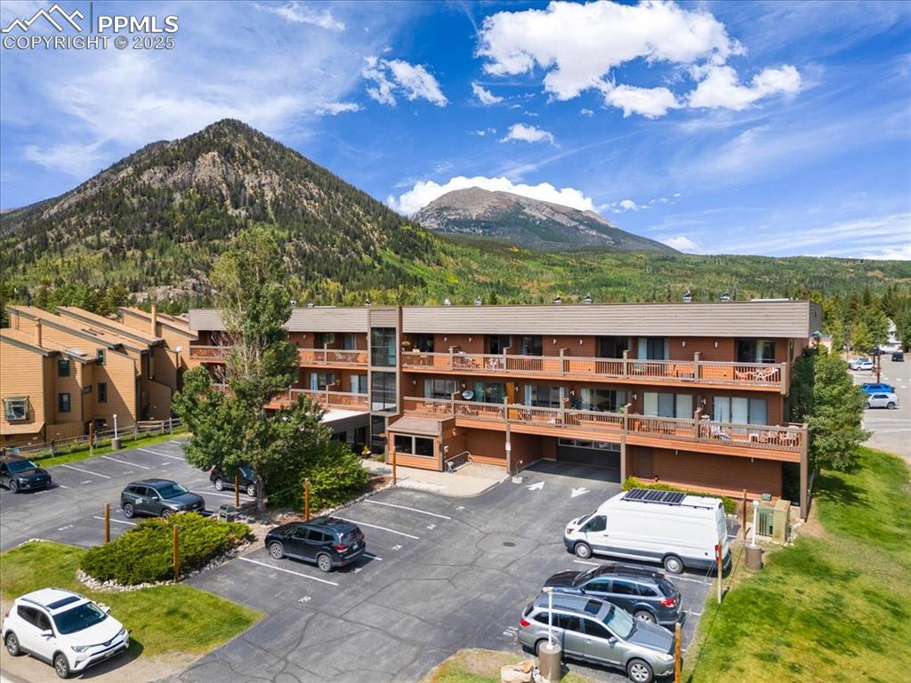 99 Granite Street, Unit 218 Frisco, CO 80443 - Photo 33 of 38 a view of a balcony with chairs and a potted plant