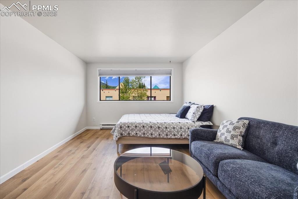 99 Granite Street, Unit 218 Frisco, CO 80443 - Photo 4 of 38 a living room with furniture and a window