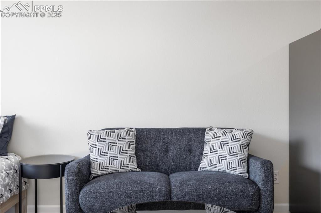 99 Granite Street, Unit 218 Frisco, CO 80443 - Photo 7 of 38 a living room with furniture and a couch