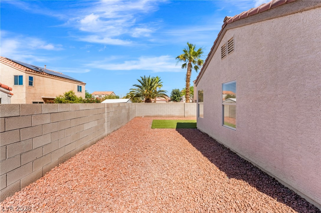 668 Rising Brook Drive Henderson, NV 89011 - Photo 21 of 22 A private, low-maintenance yard offers serene outdoor living.