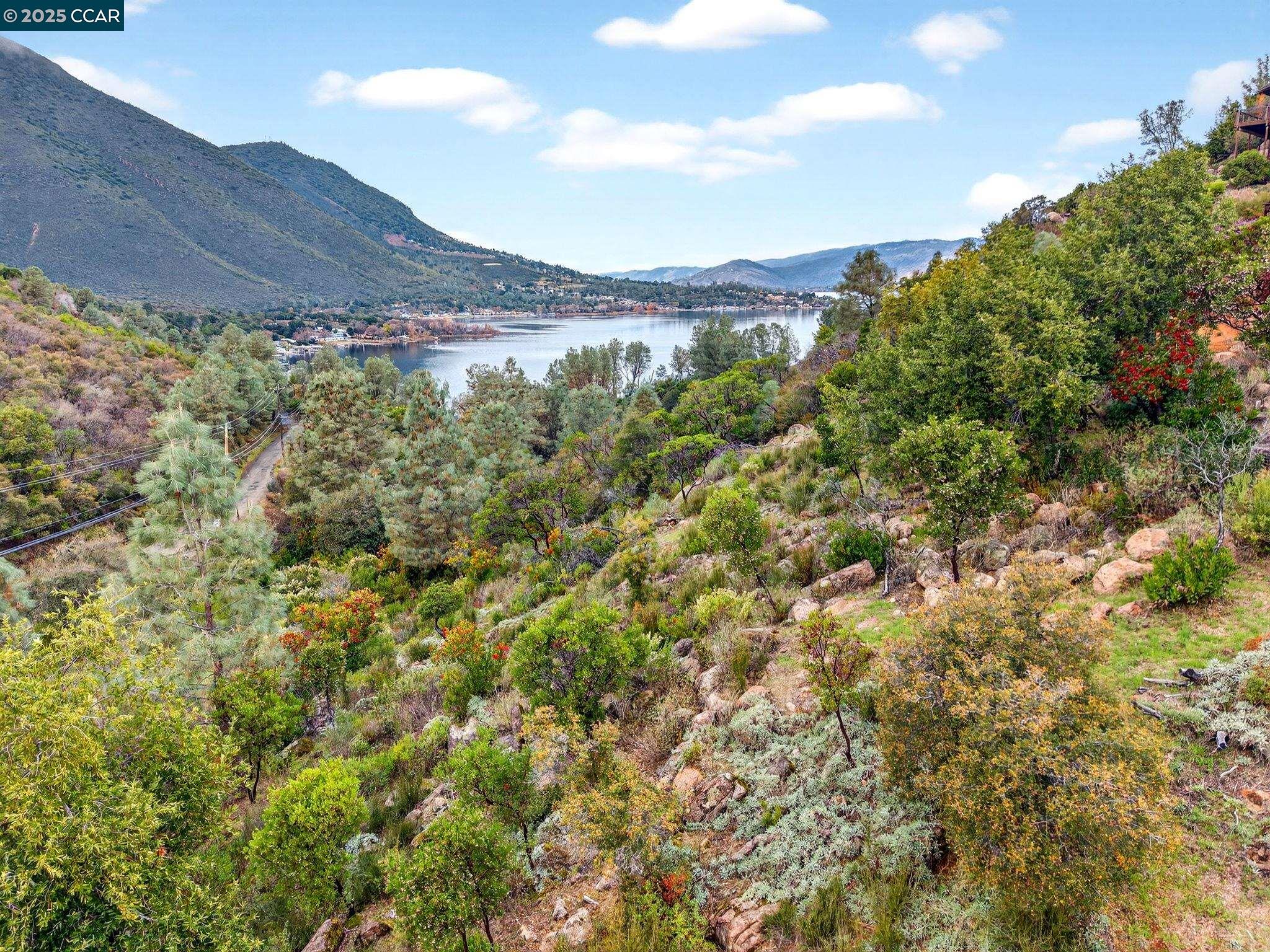 9720 Sequoia Road Kelseyville, CA 95451 - Photo 11 of 15 a view of a lot of trees and mountain