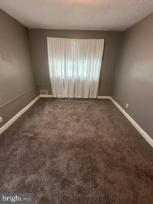1619 Inverness Avenue Baltimore, MD 21230 - Photo 19 of 30 an empty room with windows