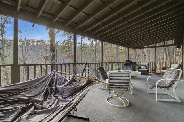 a view of a chairs in wooden deck