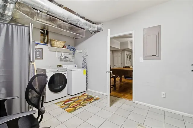 a utility room with dryer and washer