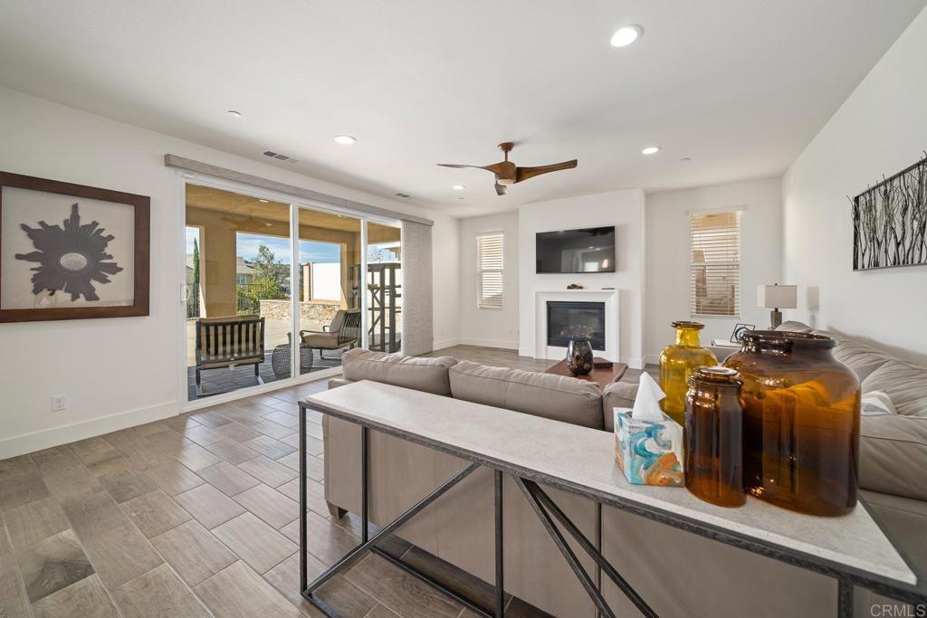 35764 Bay Morgan Lane Fallbrook, CA 92028 - Photo 17 of 69 a living room with fireplace furniture and a flat screen tv