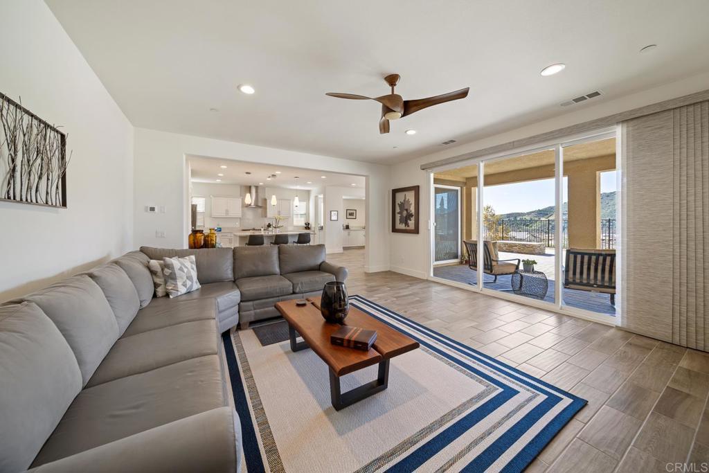 35764 Bay Morgan Lane Fallbrook, CA 92028 - Photo 19 of 69 a living room with furniture and a large window