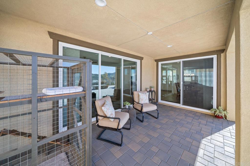 35764 Bay Morgan Lane Fallbrook, CA 92028 - Photo 28 of 69 a living room with furniture and a large window