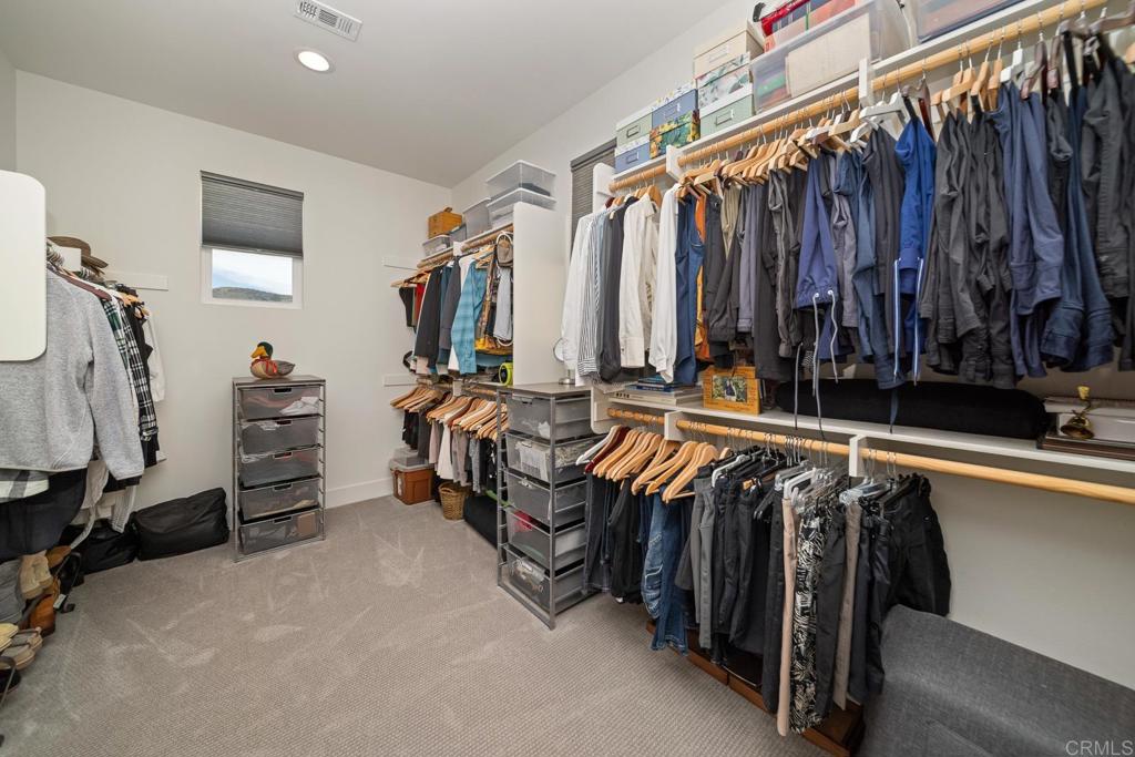 35764 Bay Morgan Lane Fallbrook, CA 92028 - Photo 34 of 69 a view of walk in closet with clothes and shoes