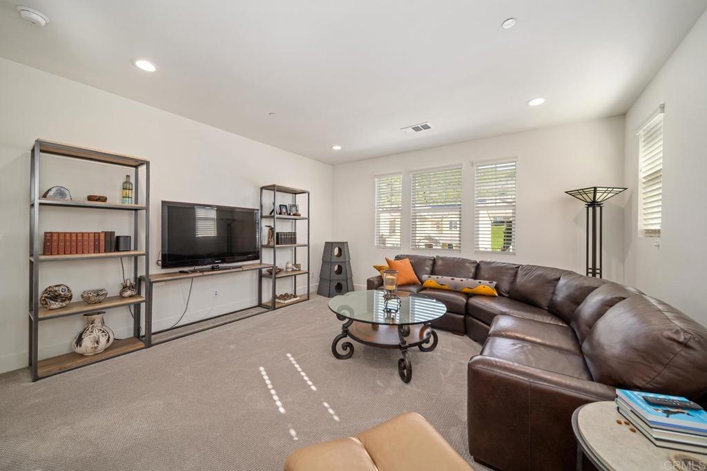 35764 Bay Morgan Lane Fallbrook, CA 92028 - Photo 36 of 69 a living room with furniture and a flat screen tv