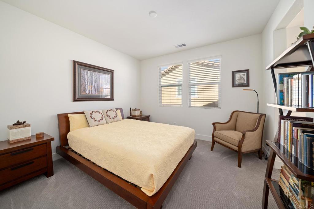 35764 Bay Morgan Lane Fallbrook, CA 92028 - Photo 40 of 69 a bedroom with a bed and a couch