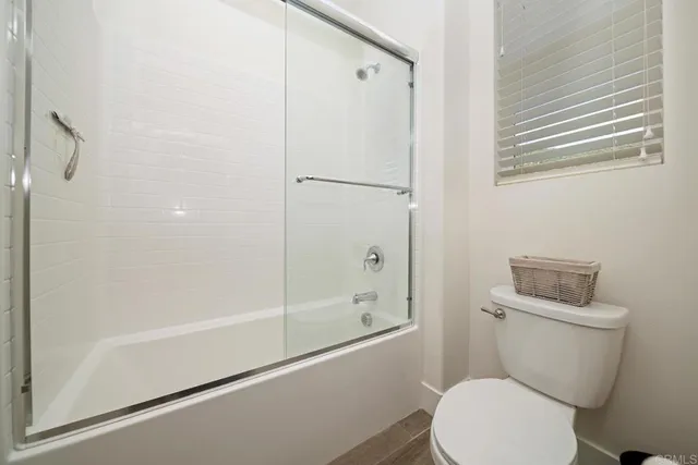 an aerial view of residential house and green space