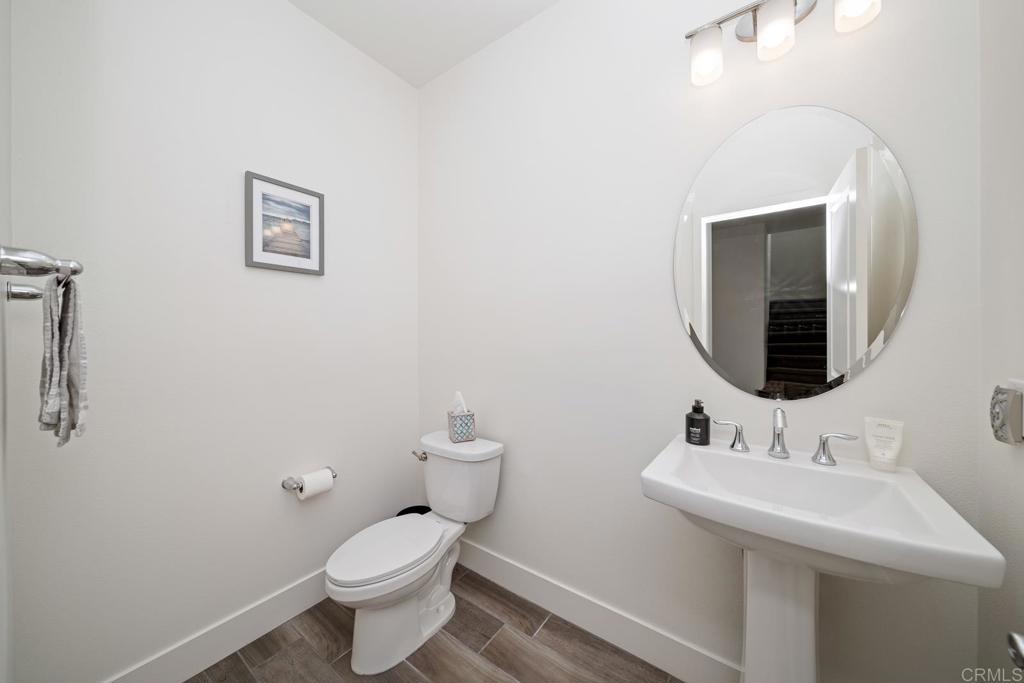 35764 Bay Morgan Lane Fallbrook, CA 92028 - Photo 7 of 69 a bathroom with a sink toilet and mirror