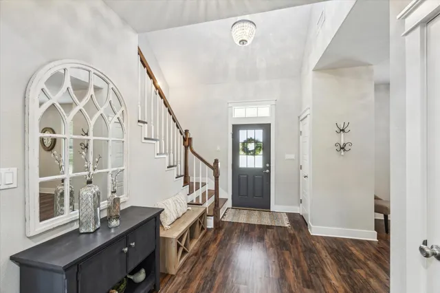 a view of entryway with wooden floor