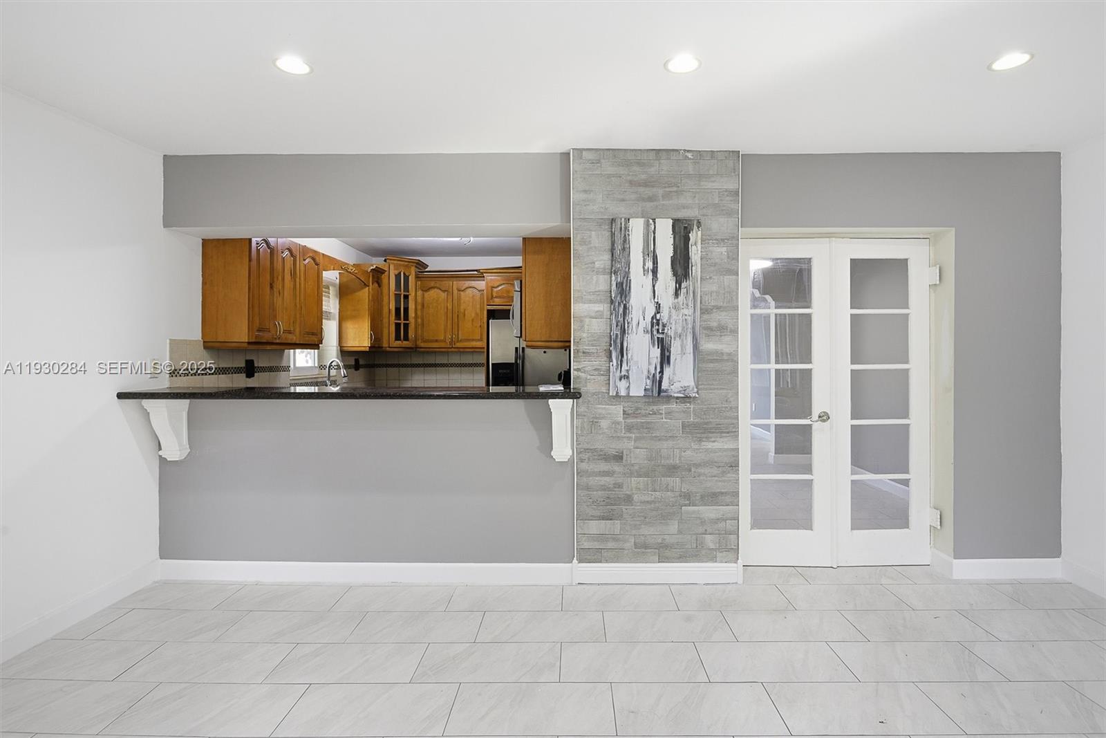 2120 Southwest 16th Street Miami, FL 33145 - Photo 11 of 47 a view of kitchen with granite countertop a sink and cabinets