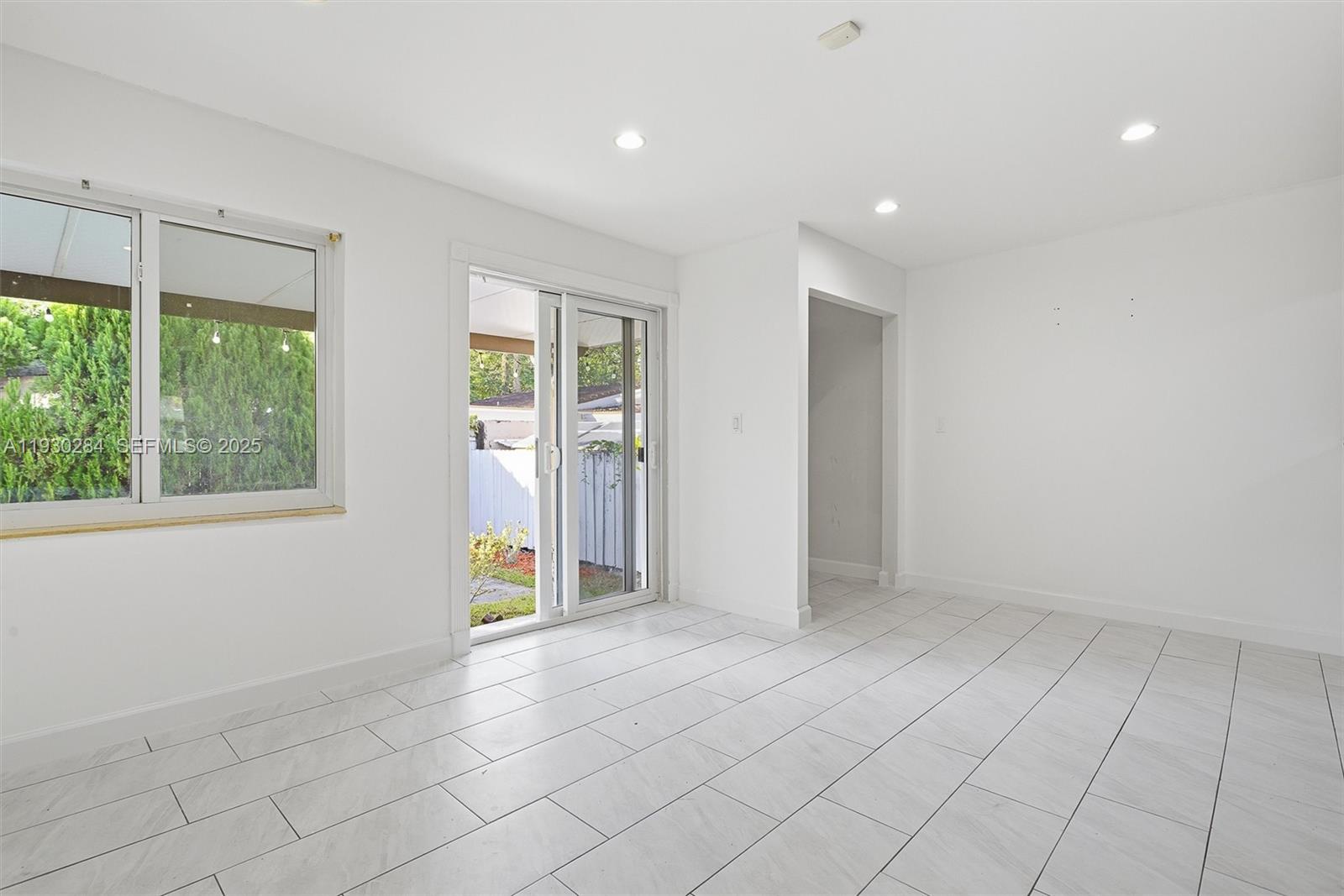 2120 Southwest 16th Street Miami, FL 33145 - Photo 12 of 47 an empty room with windows