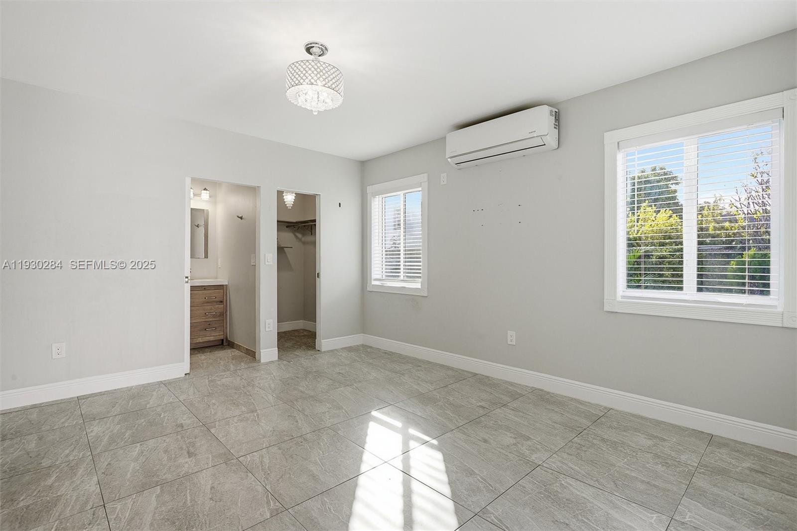 2120 Southwest 16th Street Miami, FL 33145 - Photo 17 of 47 a view of an empty room with a window