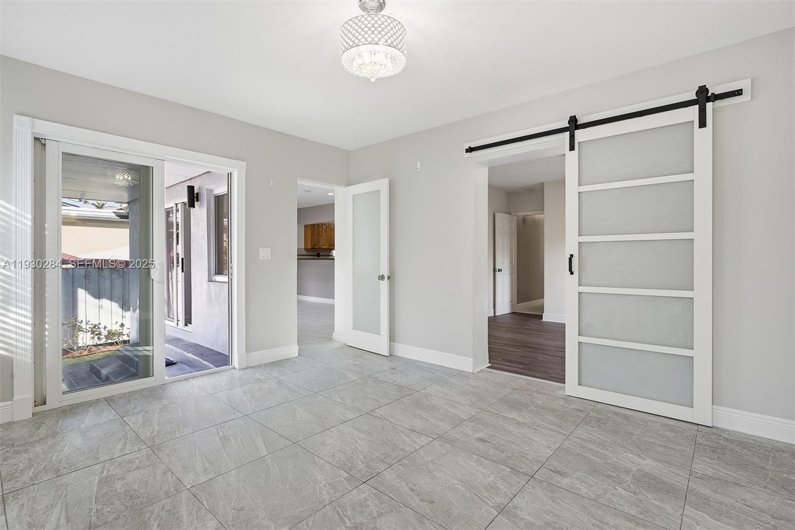 2120 Southwest 16th Street Miami, FL 33145 - Photo 19 of 47 a view of an empty room with cabinet and mirrors