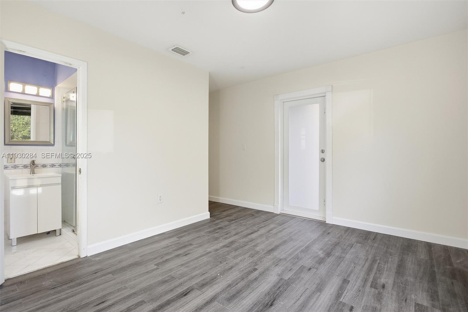 2120 Southwest 16th Street Miami, FL 33145 - Photo 28 of 47 a view of a room with wooden floor