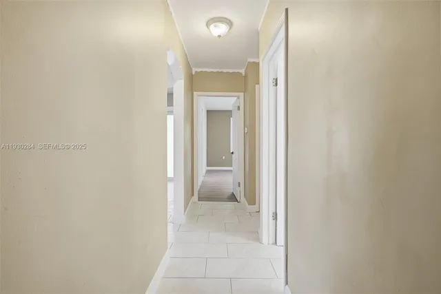 front view of a house with a garden