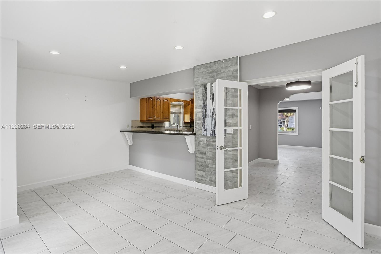 2120 Southwest 16th Street Miami, FL 33145 - Photo 10 of 47 a view of a kitchen with refrigerator and a sink