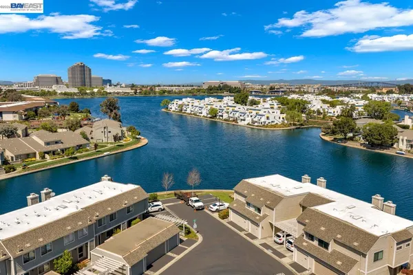a view of a lake with a city