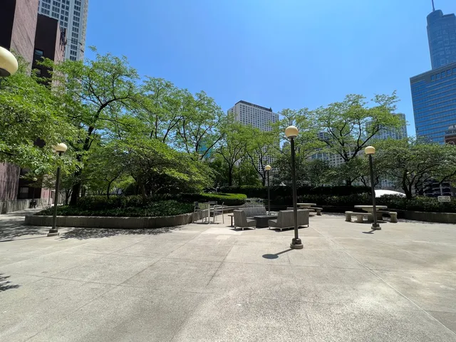 a view of outdoor space with seating area and trees