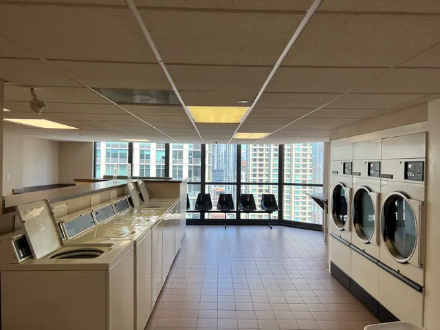 a view of a storage & utility room with washer and dryer