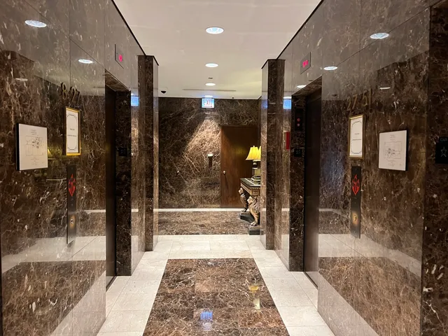 a view of a hallway with dining room