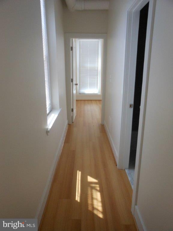 218 East Chase Street, Unit 3 Baltimore, MD 21202 - Photo 6 of 13 Hallway to Bedrooms