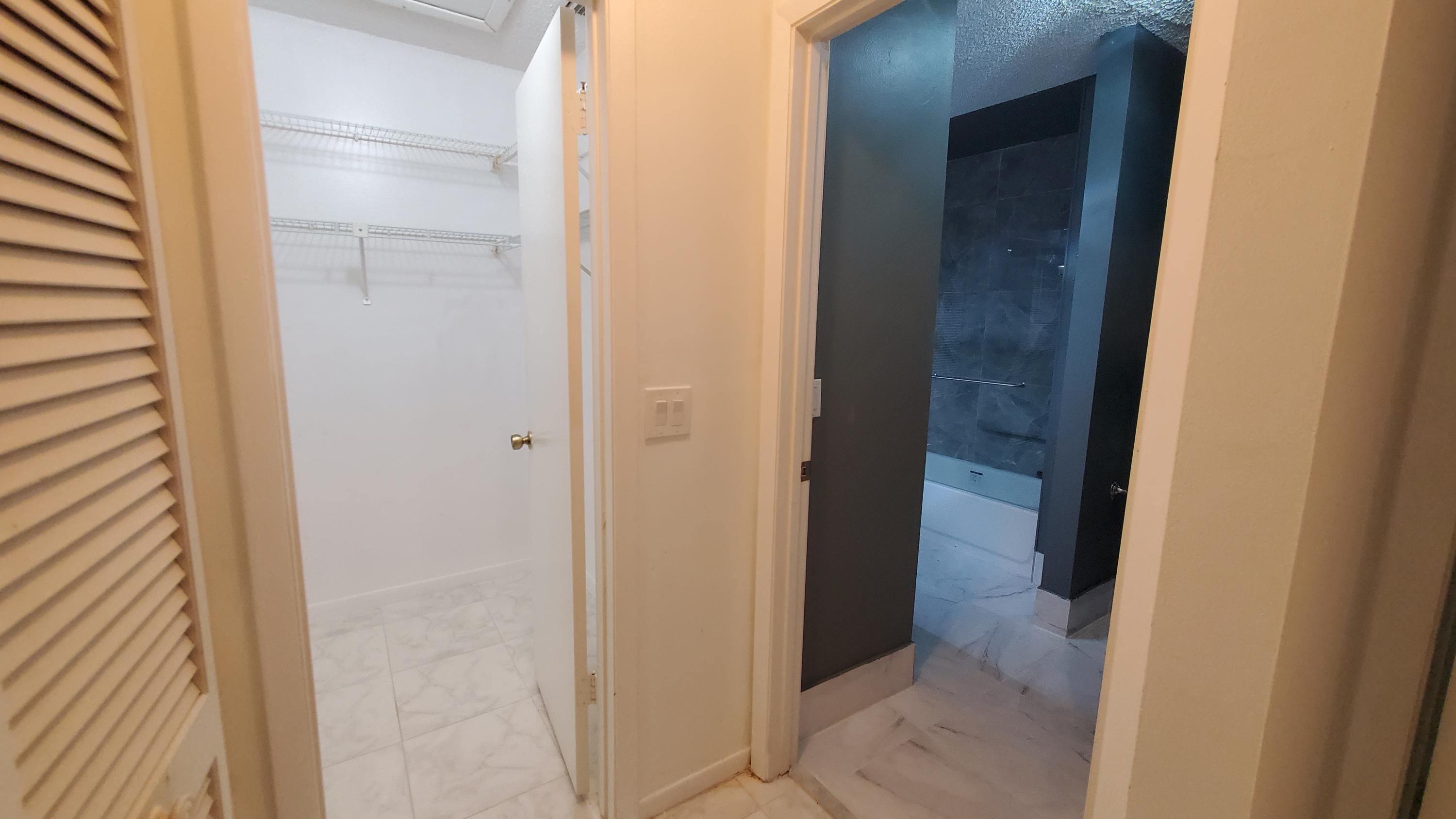 9876 Majorca Place Boca Raton, FL 33434 - Photo 18 of 33 master closet/bath